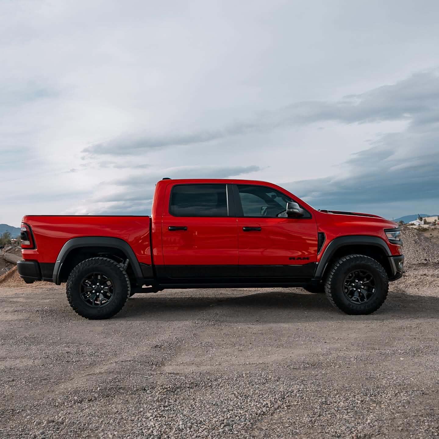 Red Ram 1500 TRX with dark window tint on all side windows