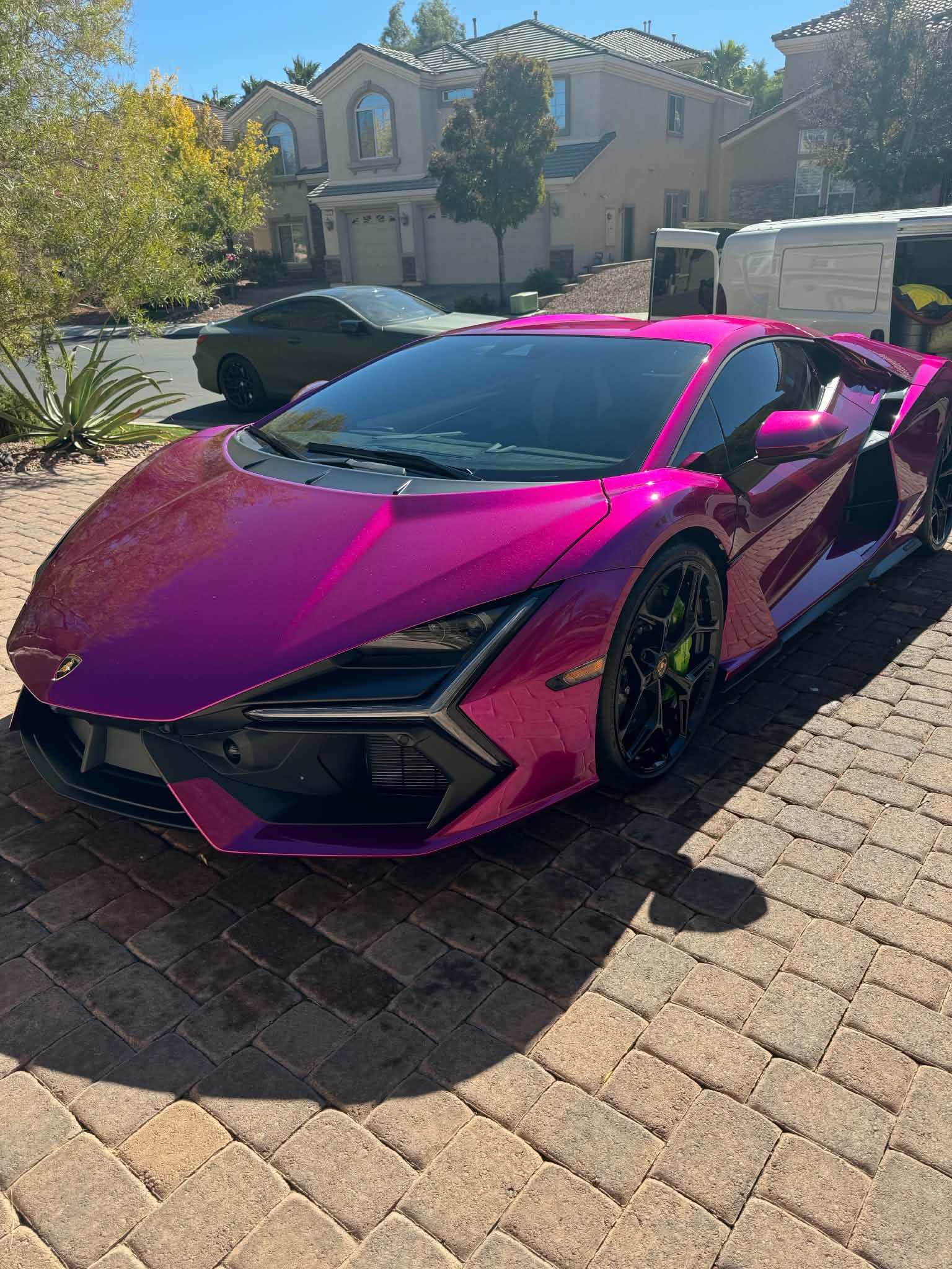 Lamborghini with dark window tint applied to the windshield and side windows