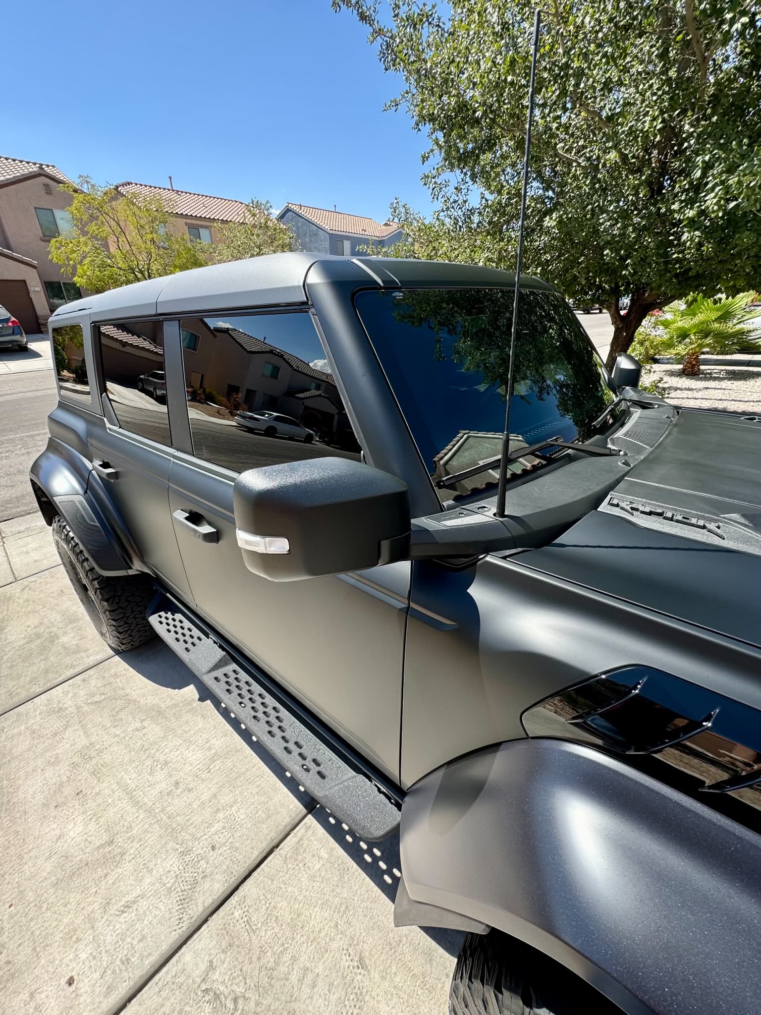 Matte black Ford Bronco Raptor with window tint installed